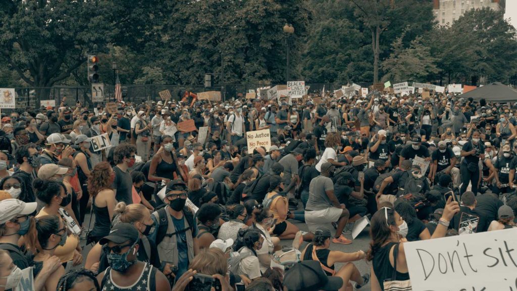 Black Lives Matter protestors kneeling